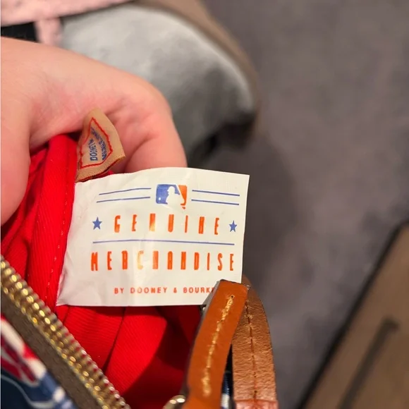 Dooney & Bourke
Chicago Cubs Nylon Triple Zip Crossbody - Picture 9 of 9